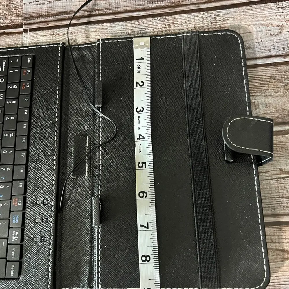 Tablet case and Keyboard. Can hold up to a 9” tablet.
